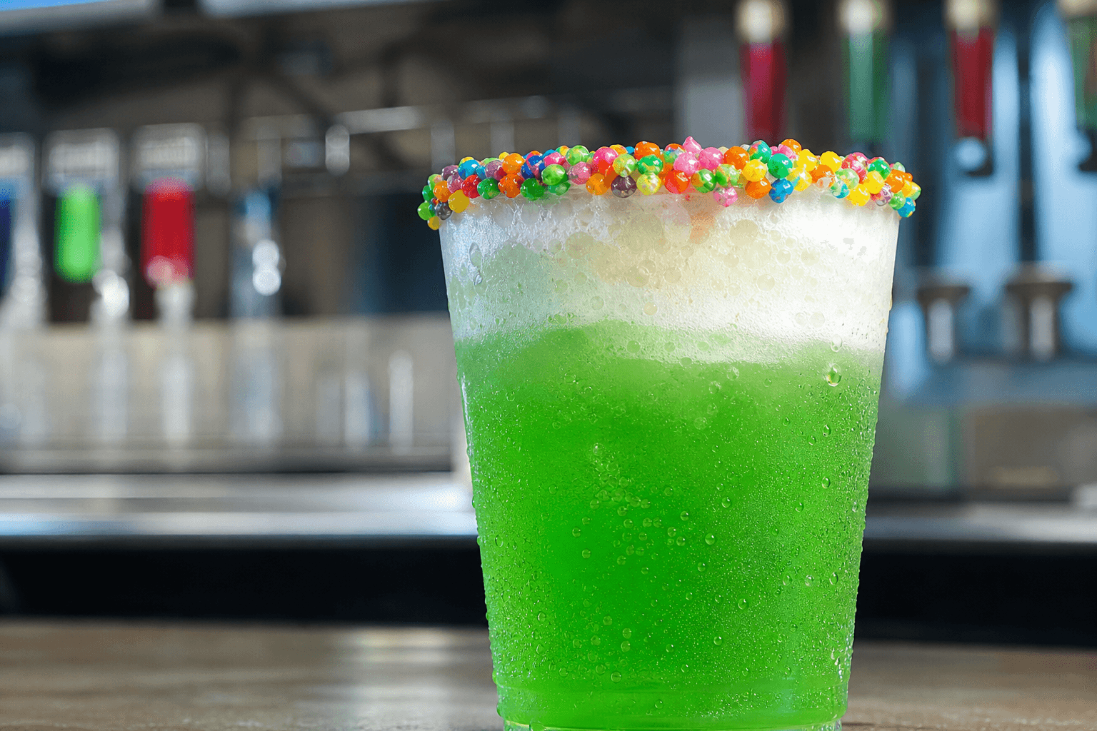 Green cream soda with a bright candy rim
