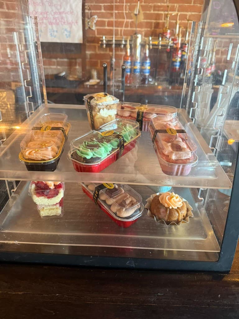 Fresh dessert cups on display at the counter