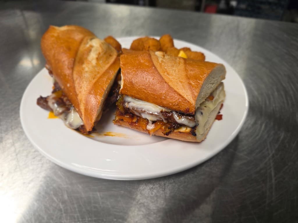 Toasted steak and cheese sandwich