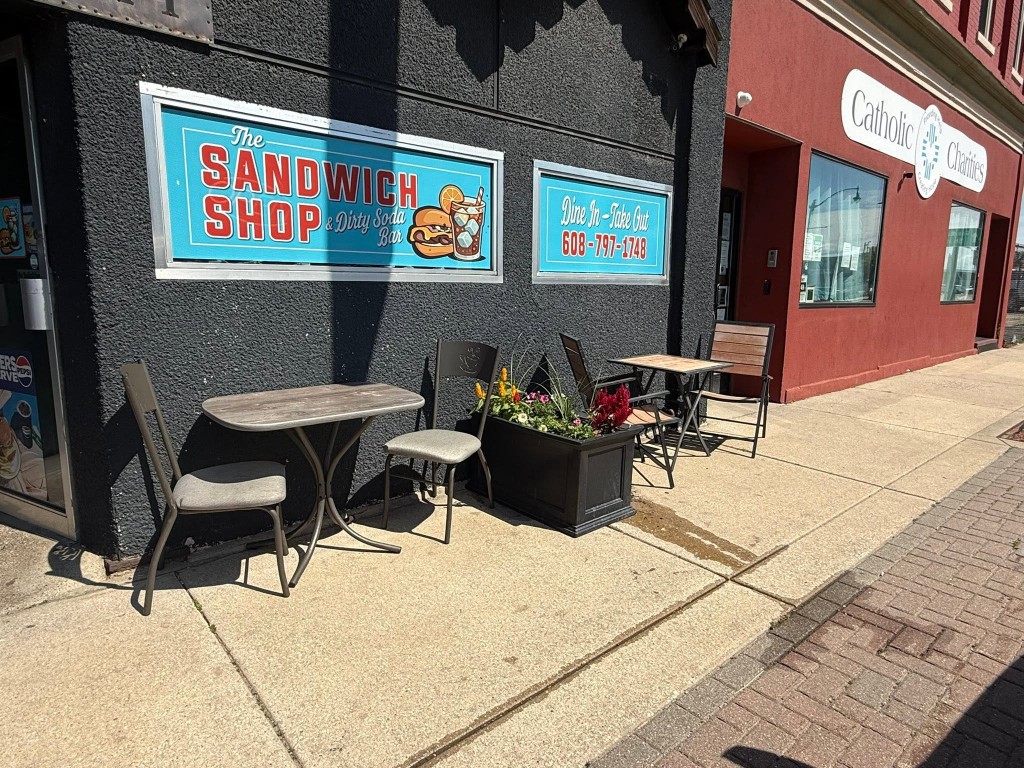 Outdoor seating in front of the shop